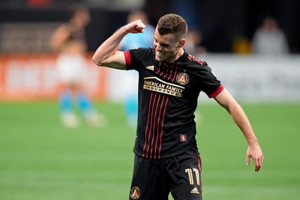 Mar 13, 2022; Atlanta, Georgia, USA; Atlanta United defender Brooks Lennon (11) celebrate their win against Charlotte FC during the second half at Mercedes-Benz Stadium. Atlanta United won 2-1. Mandatory Credit: Dale Zanine-USA TODAY Sports