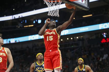 Mar 13, 2022; Atlanta, Georgia, USA; Atlanta Hawks center Clint Capela (15) grabs a rebound against the Indiana Pacers in the first quarter at State Farm Arena. Mandatory Credit: Brett Davis-USA TODAY Sports