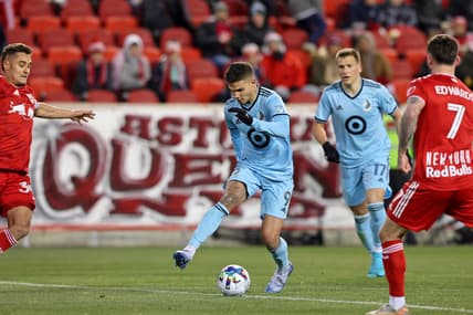 Mar 13, 2022; Harrison, New Jersey, USA; Minnesota United forward Luis Amarilla (9) dribbles the ball against the New York Red Bulls during the first half at Red Bull Arena. Mandatory Credit: Vincent Carchietta-USA TODAY Sports
