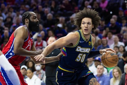 Mar 14, 2022; Philadelphia, Pennsylvania, USA; Denver Nuggets forward Aaron Gordon (50) drives to the basket against Philadelphia 76ers guard James Harden (1) during the first quarter at Wells Fargo Center. Mandatory Credit: Bill Streicher-USA TODAY Sports