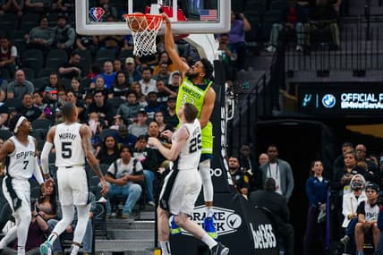 Mar 14, 2022; San Antonio, Texas, USA; Minnesota Timberwolves center Karl-Anthony Towns (32) dunks in the first half against the San Antonio Spurs at the AT&T Center. Mandatory Credit: Daniel Dunn-USA TODAY Sports