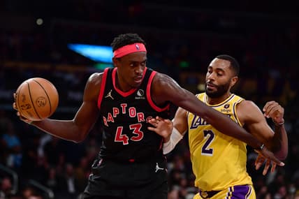 Mar 14, 2022; Los Angeles, California, USA; Toronto Raptors forward Pascal Siakam (43) moves the ball against Los Angeles Lakers guard Wayne Ellington (2) during the second half at Crypto.com Arena. Mandatory Credit: Gary A. Vasquez-USA TODAY Sports