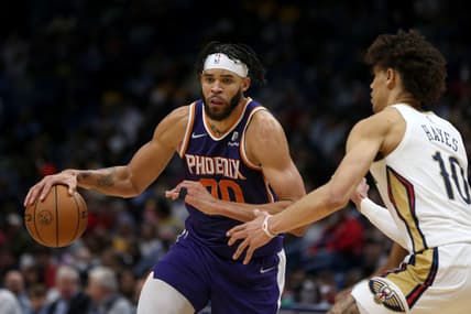Mar 15, 2022; New Orleans, Louisiana, USA; Phoenix Suns center JaVale McGee (00) is defended by New Orleans Pelicans center Jaxson Hayes (10) in the second half at the Smoothie King Center. Mandatory Credit: Chuck Cook-USA TODAY Sports