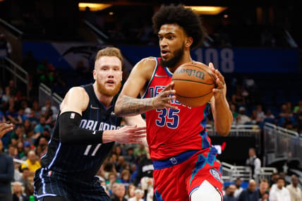 Mar 17, 2022; Orlando, Florida, USA;  Detroit Pistons forward Marvin Bagley III (35) drives to the basket past Orlando Magic forward Ignas Brazdeikis (17) in the second quarter at Amway Center. Mandatory Credit: Nathan Ray Seebeck-USA TODAY Sports