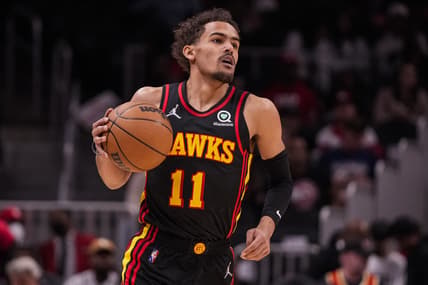 Mar 20, 2022; Atlanta, Georgia, USA; Atlanta Hawks guard Trae Young (11) brings the ball up the court against the New Orleans Pelicans during the first half at State Farm Arena. Mandatory Credit: Dale Zanine-USA TODAY Sports