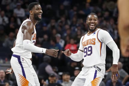 Mar 23, 2022; Minneapolis, Minnesota, USA; Phoenix Suns center Deandre Ayton (22) celebrates with forward Jae Crowder (99) after making a three point basket against the Minnesota Timberwolves to set his personal best for points in a game at Target Center. Mandatory Credit: Bruce Kluckhohn-USA TODAY Sports