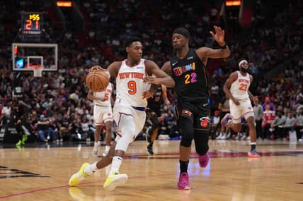 Mar 25, 2022; Miami, Florida, USA; New York Knicks guard RJ Barrett (9) drives the ball around Miami Heat forward Jimmy Butler (22) during the second half at FTX Arena. Mandatory Credit: Jasen Vinlove-USA TODAY Sports