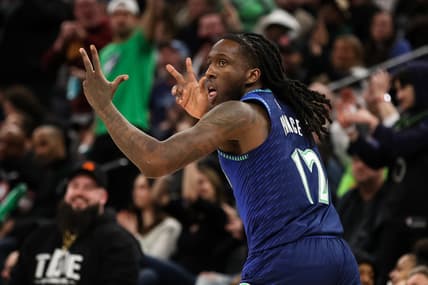 Mar 25, 2022; Minneapolis, Minnesota, USA; Minnesota Timberwolves forward Taurean Prince (12) celebrates a three-point basket against the Dallas Mavericks in the third quarter at Target Center. Mandatory Credit: David Berding-USA TODAY Sports