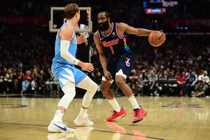 Mar 25, 2022; Los Angeles, California, USA; Philadelphia 76ers guard James Harden (1) controls the ball against Los Angeles Clippers guard Luke Kennard (5) during the second half at Crypto.com Arena. Mandatory Credit: Gary A. Vasquez-USA TODAY Sports