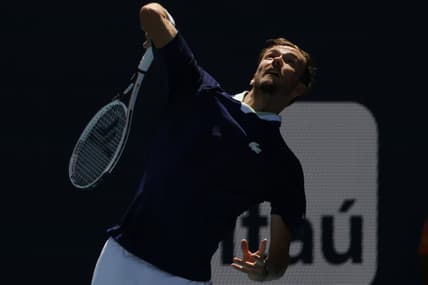Mar 26, 2022; Miami Gardens, FL, USA; Daniil Medvedev serves against Andy Murray (GBR) (not pictured) in a second round men's singles match in the Miami Open at Hard Rock Stadium. Mandatory Credit: Geoff Burke-USA TODAY Sports