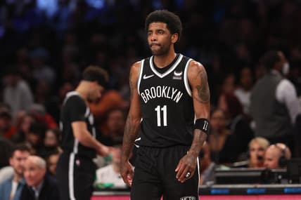 Mar 27, 2022; Brooklyn, New York, USA; Brooklyn Nets guard Kyrie Irving (11) walks on to the court after a time-out during the second half against the Charlotte Hornets at Barclays Center. Mandatory Credit: Vincent Carchietta-USA TODAY Sports