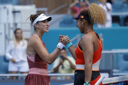 Mar 31, 2022; Miami Gardens, FL, USA; Naomi Osaka (JPN)(R) shakes hands with Belinda Bencic (SUI)(L) after their women's singles semifinal in the Miami Open at Hard Rock Stadium. Mandatory Credit: Geoff Burke-USA TODAY Sports
