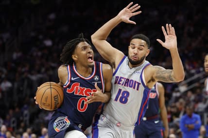 Mar 31, 2022; Detroit, Michigan, USA;  Philadelphia 76ers guard Tyrese Maxey (0) dribbles on Detroit Pistons guard Cory Joseph (18) in the first half at Little Caesars Arena. Mandatory Credit: Rick Osentoski-USA TODAY Sports