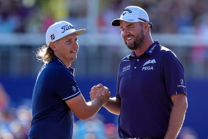Apr 25, 2021; Avondale, Louisiana, USA; Cameron Smith shakes hands with Marc Leishman after winning the final round round of the Zurich Classic of New Orleans golf tournament. Mandatory Credit: Stephen Lew-USA TODAY Sports