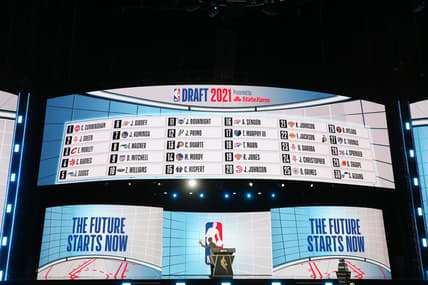 Jul 29, 2021; Brooklyn, New York, USA; NBA commissioner Adam Silver waves as he walks off the stage after the first round of the 2021 NBA Draft at Barclays Center. Mandatory Credit: Brad Penner-USA TODAY Sports