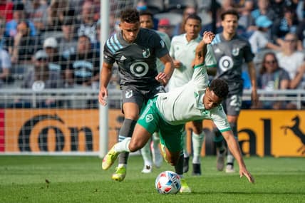 Oct 10, 2021; Saint Paul, Minnesota, USA; Colorado Rapids defender Auston Trusty (5) is tripped by Minnesota United midfielder Hassani Dotson (31) in the first half at Allianz Field. Mandatory Credit: Matt Blewett-USA TODAY Sports