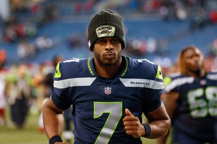 Nov 21, 2021; Seattle, Washington, USA; Seattle Seahawks quarterback Geno Smith (7) jogs to the locker room following a 23-13 loss against the Arizona Cardinals at Lumen Field. Mandatory Credit: Joe Nicholson-USA TODAY Sports