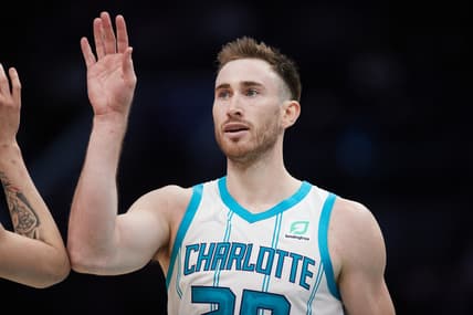 Jan 5, 2022; Charlotte, North Carolina, USA; Charlotte Hornets forward Gordon Hayward (20) high fives a teammate during second half action against the Detroit Pistons at Spectrum Center. Mandatory Credit: Brian Westerholt-USA TODAY Sports