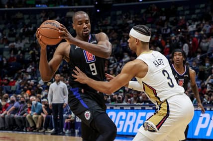Jan 13, 2022; New Orleans, Louisiana, USA;  LA Clippers center Serge Ibaka (9) controls the ball against New Orleans Pelicans guard Josh Hart (3) during the second half at the Smoothie King Center. Mandatory Credit: Stephen Lew-USA TODAY Sports