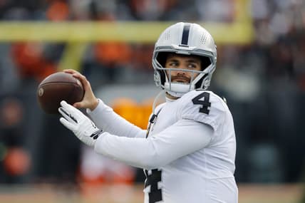 Jan 15, 2022; Cincinnati, Ohio, USA; Las Vegas Raiders quarterback Derek Carr (4) warms up before the AFC Wild Card playoff football game against the Cincinnati Bengals at Paul Brown Stadium. Mandatory Credit: Joseph Maiorana-USA TODAY Sports