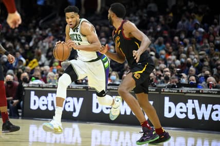Jan 26, 2022; Cleveland, Ohio, USA; Milwaukee Bucks forward Giannis Antetokounmpo (34) drives against Cleveland Cavaliers center Evan Mobley (4) in the fourth quarter at Rocket Mortgage FieldHouse. Mandatory Credit: David Richard-USA TODAY Sports