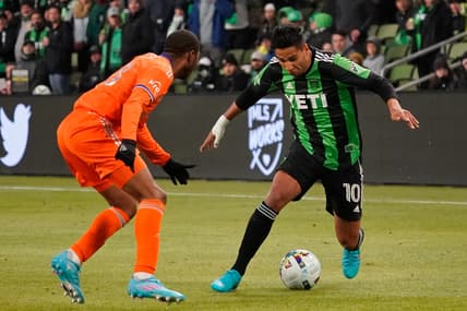 Feb 26, 2022; Austin, Texas, USA; Austin FC forward Cecilio Dominguez (10) dribbles the ball against FC Cincinnati Raymon Gaddis (28) during the second half at Q2 Stadium. Austin FC won 5-0. Mandatory Credit: Scott Wachter-USA TODAY Sports