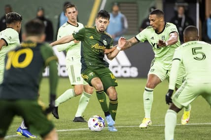 Mar 12, 2022; Portland, Oregon, USA; Austin FC defender Ruben Gabrielsen (4) defends Portland Timbers forward Diego Gutierrez (16) during the second half at Providence Park. The Timbers won the game 1-0. Mandatory Credit: Troy Wayrynen-USA TODAY Sports
