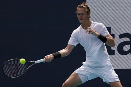 Mar 24, 2022; Miami Gardens, FL, USA; Sebastian Korda (USA) hits a forehand against Alejandro Davidovich Fokina (ESP) (not pictured) in a first round men's singles match in the Miami Open at Hard Rock Stadium. Mandatory Credit: Geoff Burke-USA TODAY Sports