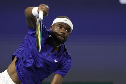Mar 25, 2022; Miami Gardens, FL, USA; Frances Tiafoe (USA) serves against Brandon Nakashima (USA) (not pictured) in a second round men's singles match in the Miami Open at Hard Rock Stadium. Mandatory Credit: Geoff Burke-USA TODAY Sports
