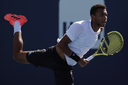 Mar 26, 2022; Miami Gardens, FL, USA; Felix Auger-Aliassime (CAN) serves against Miomir Kecmanovic (SRB)(not pictured) in a second round mens's singles match in the Miami Open at Hard Rock Stadium. Mandatory Credit: Geoff Burke-USA TODAY Sports