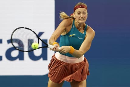 Mar 30, 2022; Miami Gardens, FL, USA; Petra Kvitova (CZE) hits a backhand against Iga Swiatek (POL)(not pictured) in a women's singles quarterfinal match in the Miami Open at Hard Rock Stadium. Mandatory Credit: Geoff Burke-USA TODAY Sports