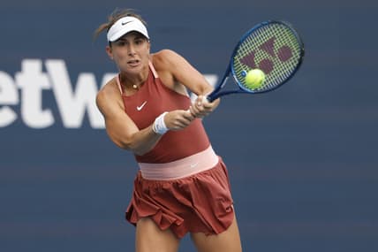 Mar 31, 2022; Miami Gardens, FL, USA; Belinda Bencic (SUI) hits a backhand against Naomi Osaka (JPN)(not pictured) in a women's singles semifinal in the Miami Open at Hard Rock Stadium. Mandatory Credit: Geoff Burke-USA TODAY Sports