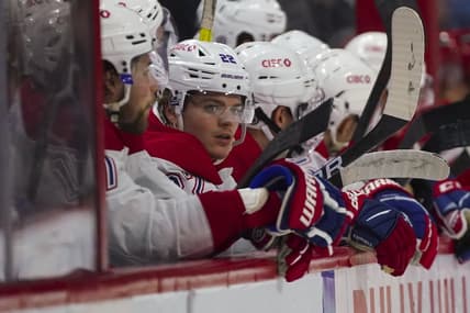 Mar 31, 2022; Raleigh, North Carolina, USA;  Montreal Canadiens right wing Cole Caufield (22) looks on against the Carolina Hurricanes during the second period at PNC Arena. Mandatory Credit: James Guillory-USA TODAY Sports