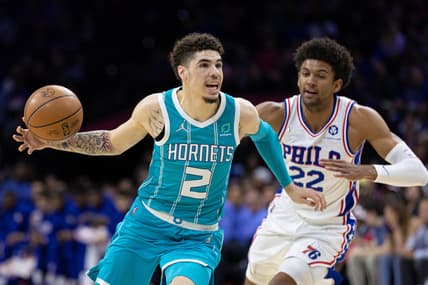 Apr 2, 2022; Philadelphia, Pennsylvania, USA; Charlotte Hornets guard LaMelo Ball (2) drives past Philadelphia 76ers guard Matisse Thybulle (22) during the first quarter at Wells Fargo Center. Mandatory Credit: Bill Streicher-USA TODAY Sports