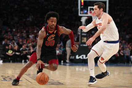 Apr 2, 2022; New York, New York, USA; Cleveland Cavaliers guard Brandon Goodwin (00) dribbles the ball past New York Knicks guard Ryan Arcidiacono (51) during the second quarter at Madison Square Garden. Mandatory Credit: Tom Horak-USA TODAY Sports