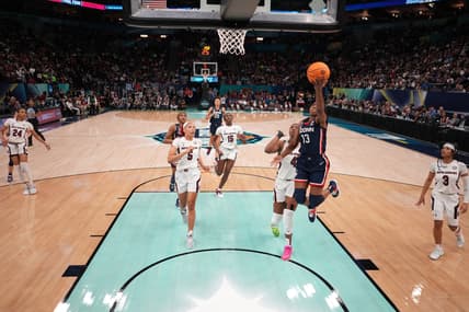 Apr 3, 2022; Minneapolis, MN, USA; UConn Huskies guard Christyn Williams (13) shoots the ball against the South Carolina Gamecocks  in the Final Four championship game of the women's college basketball NCAA Tournament at Target Center. Mandatory Credit: Kirby Lee-USA TODAY Sports