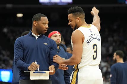 Apr 5, 2022; Sacramento, California, USA; New Orleans Pelicans head coach Willie Green and guard CJ McCollum (3) talk before the game against the Sacramento Kings at Golden 1 Center. Mandatory Credit: Darren Yamashita-USA TODAY Sports