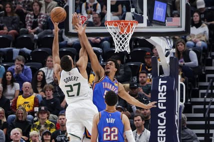 Apr 6, 2022; Salt Lake City, Utah, USA;  Utah Jazz center Rudy Gobert (27) shoots the ball against Oklahoma City Thunder forward Jeremiah Robinson-Earl (50) during the second quarter at Vivint Arena. Mandatory Credit: Chris Nicoll-USA TODAY Sports