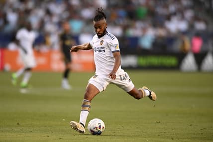 Apr 9, 2022; Carson, California, USA; Los Angeles Galaxy forward Raheem Edwards (44) looks to kick the ball in the second half of their Major League Soccer match against the Los Angeles FC at the StubHub Center. Los Angeles Galaxy won, 2-1. Mandatory Credit: Orlando Ramirez-USA TODAY Sports