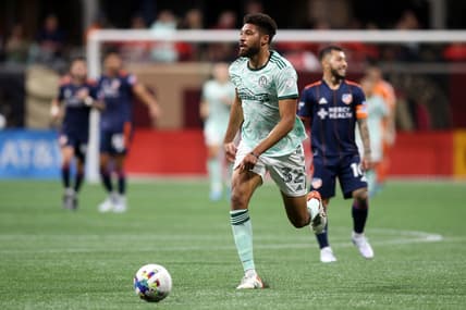 Apr 16, 2022; Atlanta, Georgia, USA; Atlanta United defender George Campbell (32) controls the ball in the first half against the FC Cincinnati at Mercedes-Benz Stadium. Mandatory Credit: Brett Davis-USA TODAY Sports