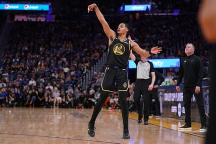 Apr 16, 2022; San Francisco, California, USA; Golden State Warriors guard Jordan Poole (3) follows through on a shot after making a three point basket against the Denver Nuggets in the fourth quarter during game one of the first round for the 2022 NBA playoffs at the Chase Center. Mandatory Credit: Cary Edmondson-USA TODAY Sports