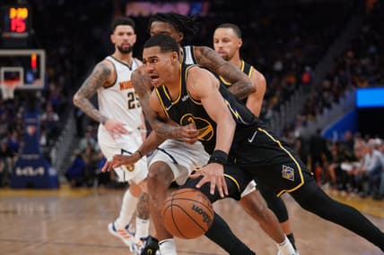Apr 16, 2022; San Francisco, California, USA; Golden State Warriors guard Jordan Poole (3) dribbles against Denver Nuggets guard Bones Hyland (3) in the fourth quarter during game one of the first round for the 2022 NBA playoffs at the Chase Center. Mandatory Credit: Cary Edmondson-USA TODAY Sports