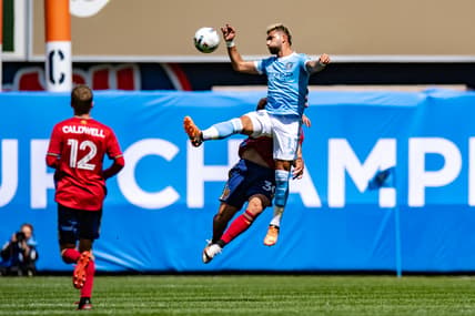 Apr 17, 2022; New York, New York, USA; New York City FC midfielder Valentin Castellanos (11) heads the ball against Real Salt Lake defender Marcelo Silva (30) during the first half at Yankee Stadium. Mandatory Credit: John Jones-USA TODAY Sports