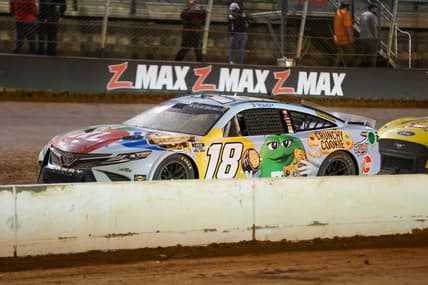 Apr 17, 2022; Bristol, Tennessee, USA; NASCAR Cup Series driver Kyle Busch (18) during a red flag at the Bristol Motor Speedway Dirt Course. Mandatory Credit: Randy Sartin-USA TODAY Sports