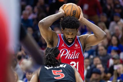Apr 18, 2022; Philadelphia, Pennsylvania, USA; Philadelphia 76ers center Joel Embiid (21) controls the ball against Toronto Raptors forward Precious Achiuwa (5) during the third quarter in game two of the first round for the 2022 NBA playoffs at Wells Fargo Center. Mandatory Credit: Bill Streicher-USA TODAY Sports