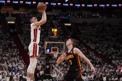 Apr 19, 2022; Miami, Florida, USA; Miami Heat guard Tyler Herro (14) puts up a shot over Atlanta Hawks guard Kevin Huerter (3) during the first half in game two of the first round for the 2022 NBA playoffs at FTX Arena. Mandatory Credit: Jasen Vinlove-USA TODAY Sports