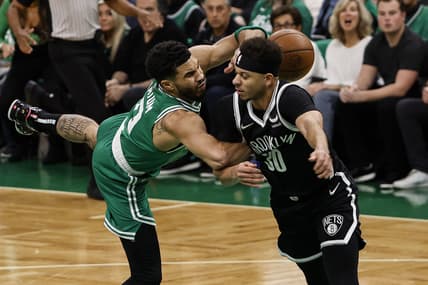 Apr 20, 2022; Boston, Massachusetts, USA; Brooklyn Nets guard Seth Curry (30) commits a flagrant foul on Boston Celtics forward Jayson Tatum (0) during the first quarter of game two of the first round for the 2022 NBA playoffs at TD Garden. Mandatory Credit: Winslow Townson-USA TODAY Sports