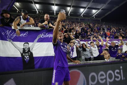 Apr 20, 2022; Orlando, Florida, USA;  Orlando City defender Thomas Williams (68) celebrates after beating the Tampa Bay Rowdies in a US Open Cup match at Exploria Stadium. Mandatory Credit: Nathan Ray Seebeck-USA TODAY Sports