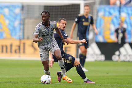 Apr 23, 2022; Chester, Pennsylvania, USA;  CF Montr  al midfielder Isma  l Kon   (28) controls the ball against Philadelphia Union midfielder D  niel Gazdag (6) during the first half at Subaru Park. Mandatory Credit: Mitchell Leff-USA TODAY Sports