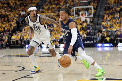 Apr 23, 2022; Salt Lake City, Utah, USA; Dallas Mavericks guard Jalen Brunson (13) dribbles past Utah Jazz guard Jordan Clarkson (00) during the first quarter in game four of the first round for the 2022 NBA playoffs at Vivint Arena. Mandatory Credit: Chris Nicoll-USA TODAY Sports